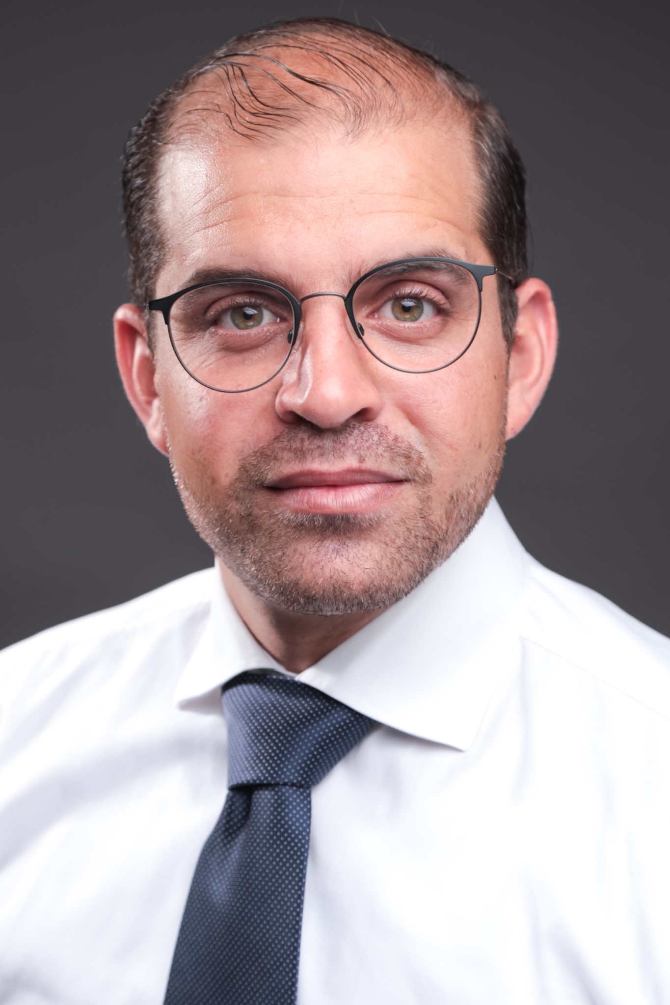 PD. Dr. Omar Thaher